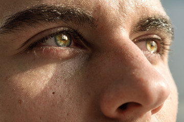 Macro shot of man's eye - Powered by Adobe