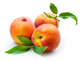 Naklejka na ściany i meble Peach. Fruits with leaves isolated on white