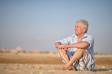 Senior man in desert