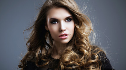 Fototapeta premium Portrait of the beautiful woman with blond hair
