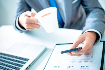 business, technology and internet concept - close up of man hand