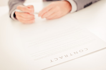 Business man signing a contract