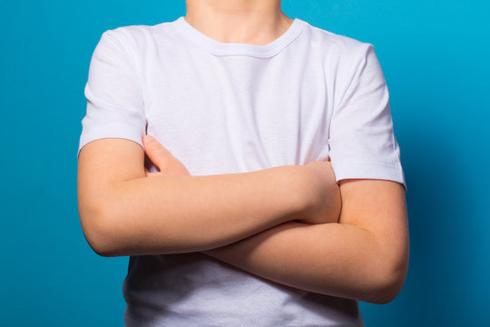chest of boy on blue background