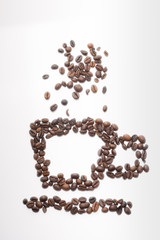 Coffee beans in the form of coffee cup and steam.