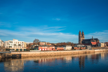 Beautiful cathedral of Magdeburg, river Elba and old town in the