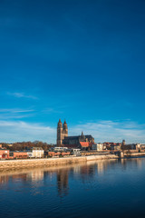 Beautiful cathedral of Magdeburg, river Elba and old town in the