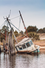 Wrecked shrimping boat half sunken