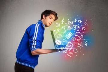 Foto op Plexiglas Casual man holding laptop with colorful hand drawn multimedia sy © ra2 studio