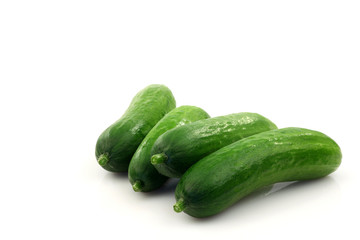fresh green baby cucumbers you can eat as a snack