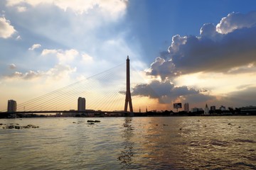 Fototapeta na wymiar Rama VIII Chao Phraya bridge at sunset, Bangkok, Thailand
