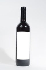 wine bottle with empty label on isolated background