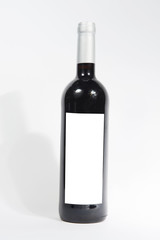 wine bottle with empty label on isolated background