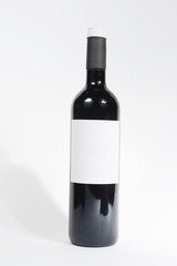 wine bottle with empty label on isolated background