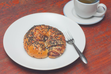 Croissant bun with black sesame topping