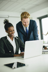 Fototapeta premium Young people in the office