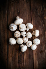 White mushrooms on wood table