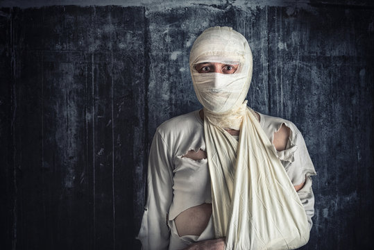 Injured Man with Head Bandages