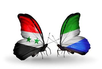 Two butterflies with flags Syria and Sierra Leone