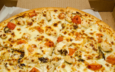 hot, tasty pizza in box