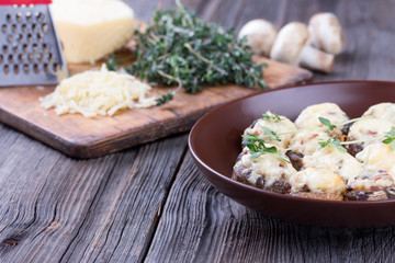 Delicious stuffed mushrooms with meat and cheese.