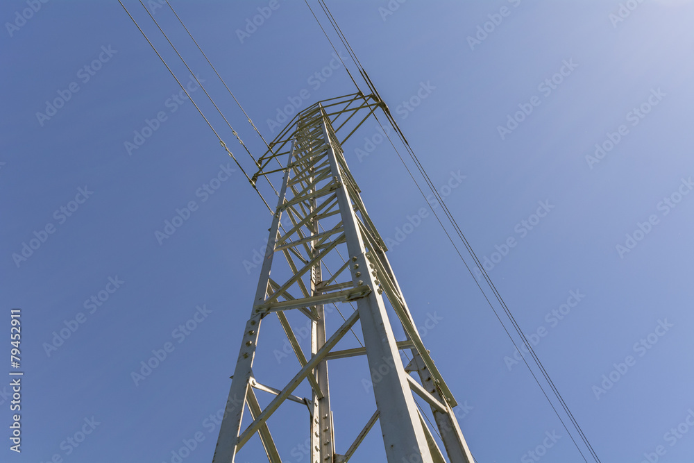 Wall mural view electrical tower from below