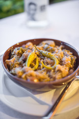 Braised cabbage with meat and pepper.