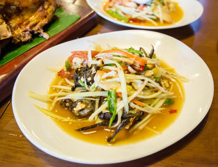 Thai papaya salad serve with vegetables