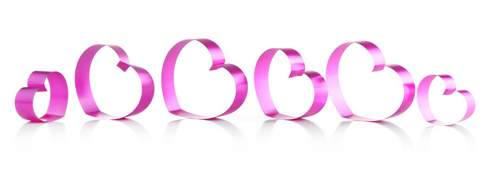 Purple hearts from ribbon isolated on white