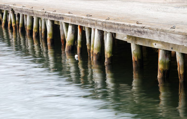 wharf reflecting in water