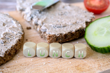 Two Slices Of Wholemeal Bread With Spread And Cucumber
