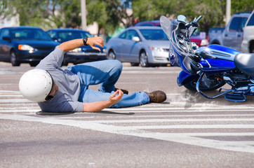 Motorcycle Wreck in Busy Intersection - 79457359