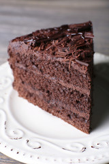 Delicious chocolate cake in white plate