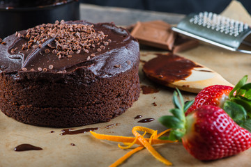 homemade chocolate torte cake on baking paper