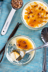 eating homemade creme brulee overhead