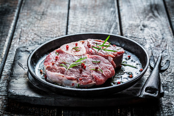 Closeup of beef with herbs ready to grill