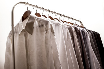 Several shirts on a hanger.