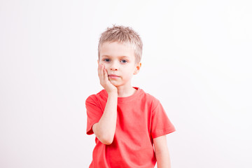 Young boy with orange tshirt