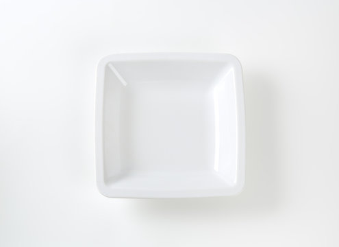Small rimmed square white serving bowl