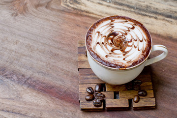 Cup of coffee on a wooden table