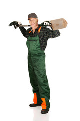 Naklejka premium Mature gardener holding a spade