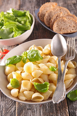 pasta, fresh salad and bread