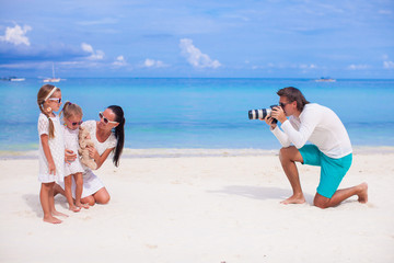 Happy family during summer beach vacation