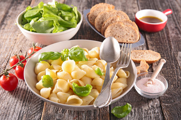 pasta, fresh salad and bread