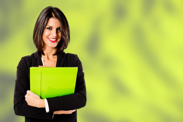 smiling professional woman on green background