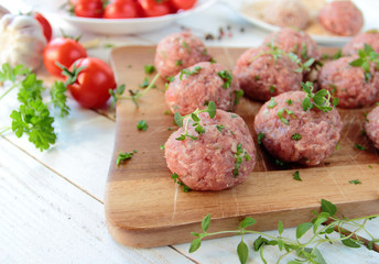 Fresh raw meat balls prepared for cooking for dinner