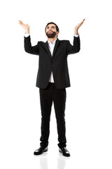 Businessman showing empty copyspace in hands.