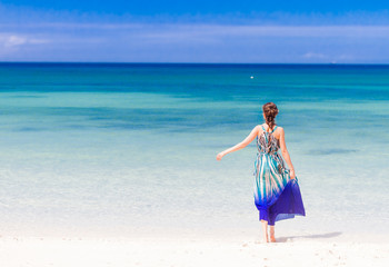 young happy woman on tropical sand beach