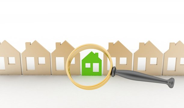 Magnifying glass selects or inspects eco-home in row of houses