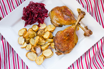 Duck confit with beetroots and jerusalem artichokes fries