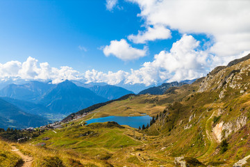 Fototapeta premium Bettmersee (Lake) and the alps in Valais